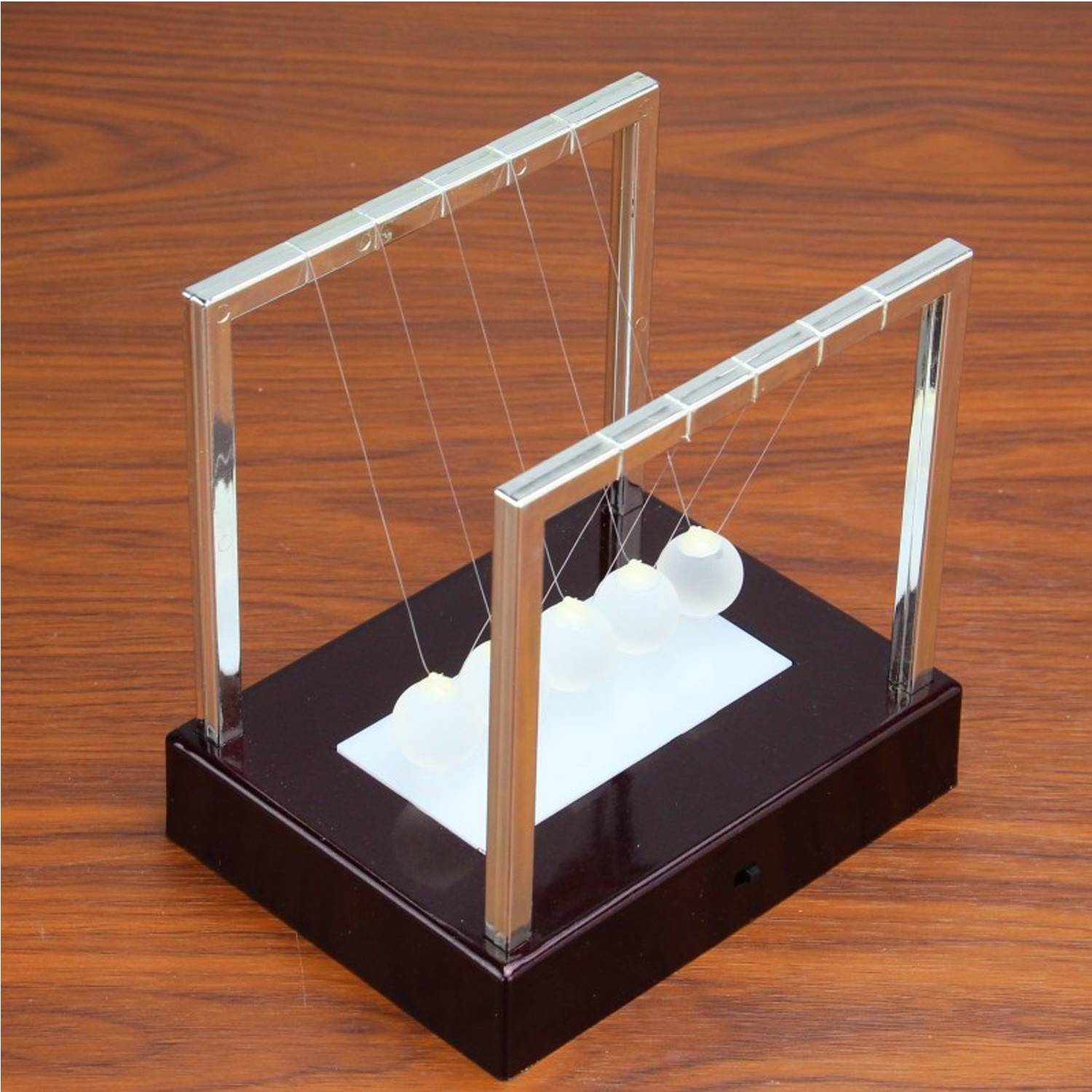 Newtons cradle pendulum LED balls 2